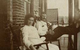 John & Annie Lucas on hotel balcony.